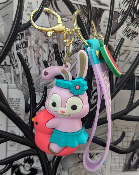 Random Cartoon - Purple rabbit on pink duck - Keychain